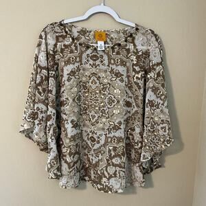 Rudy Rd. Kaleidoscope Pattern With Beaded Neckline And Circle Shape